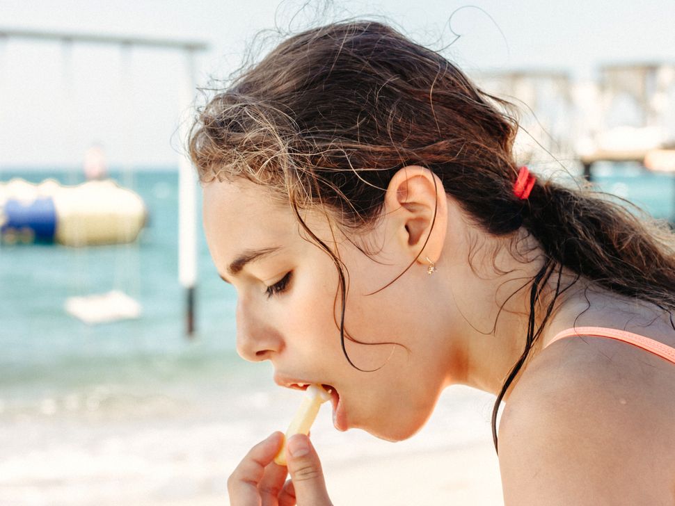 Is it dangerous to eat right before you swim?