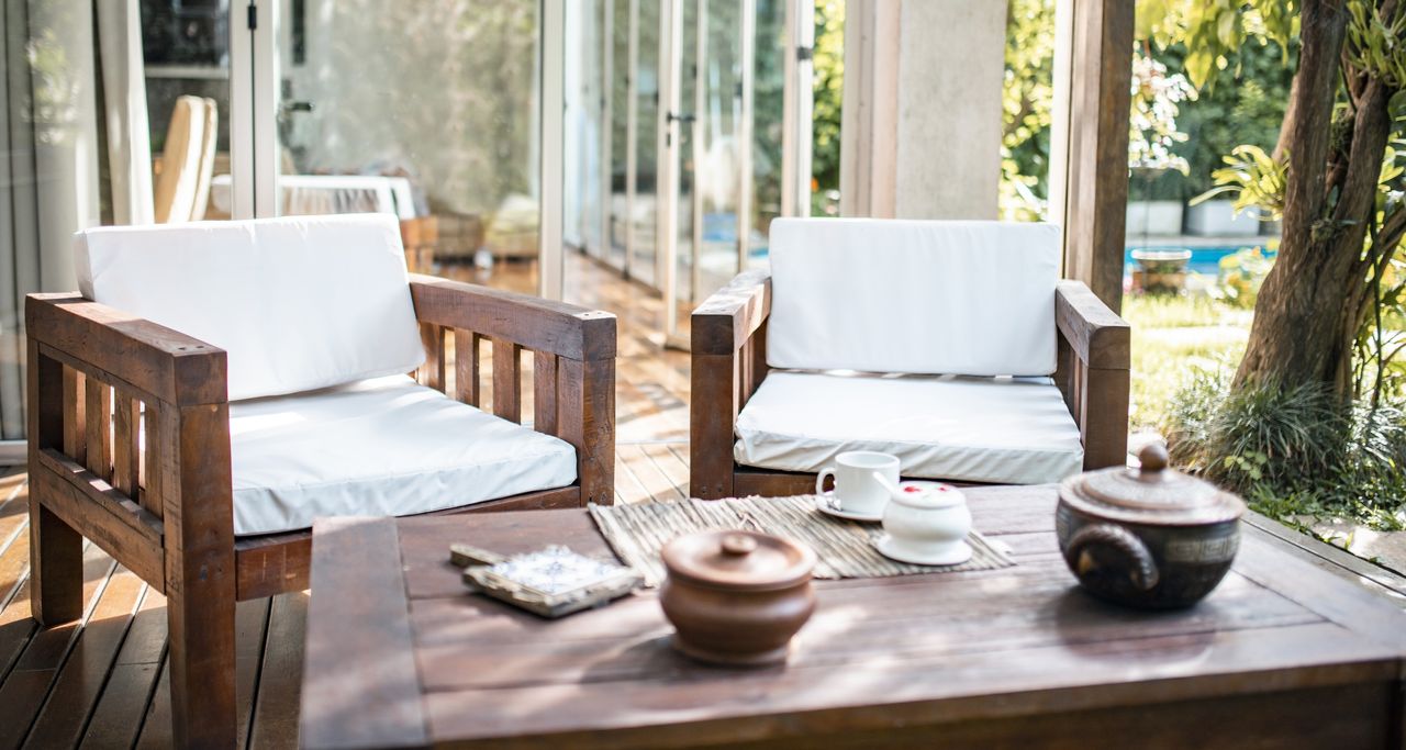 teak outdoor furniture on a deck