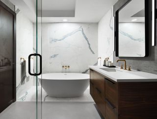 marble and white bathroom in the Poliform Penthouse design in Gansevoort Meatpacking in Manhattan New York