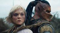 Elle Fanning as Thia and Dimitrius Schuster-Koloamatangi as Dek in "Predator: Badlands"