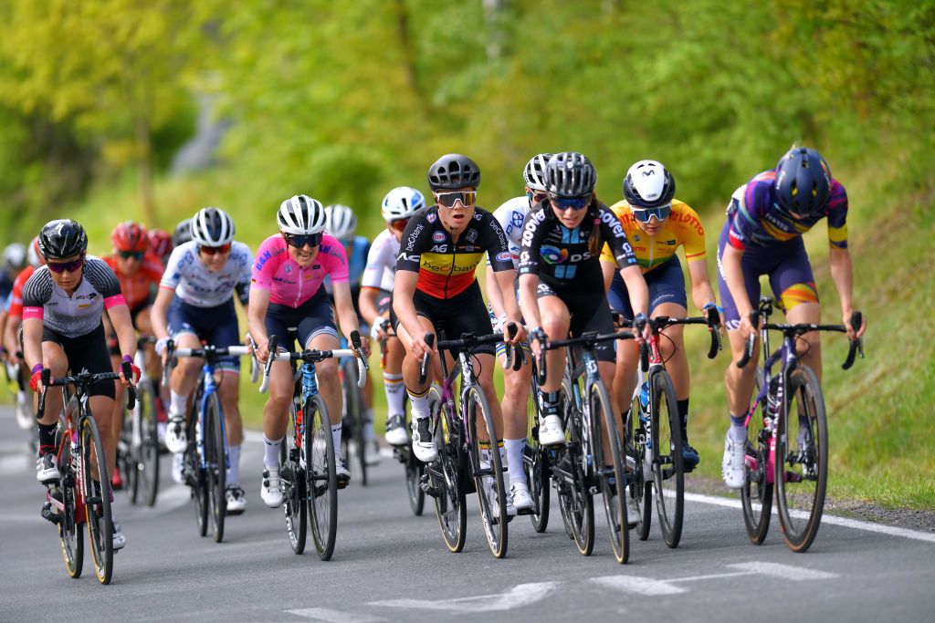 DRTENDORF GERMANY MAY 28 Lotte Kopecky of Belgium and Team Belgium Liane Lippert of Germany and Team DSM Emma Norsgaard Jorgensen of Denmark and Movistar Team yellow leader jersey Lucinda Brand of Netherlands and Trek Segafredo Purple sprint jersey in breakaway during the 34th Internationale LOTTO Thringen Ladies Tour 202 Stage 4 a 101km stage from Drtendorf to Drtendorf 420m ltlt2021 lottothueringenladiestour womencycling on May 28 2021 in Drtendorf Germany Photo by Luc ClaessenGetty Images
