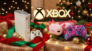 Xbox bauble, Axolotl plush, Pink Xbox Controller and Xbox shaped light with a festive background