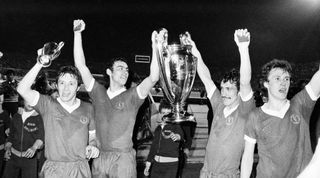 European Cup Final at the Stadio Olimpico in Rome, Italy. Liverpool 3 v Borussia Munchengladbach 1. Liverpool players Joey Jones, Ray Kennedy, Terry McDermott and Phil Neal parade the trophy to fans on a lap of honour after the match, 25th May 1977. (Photo by Monte Fresco/Mirrorpix/Getty Images)