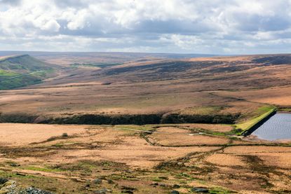 The dramatic landscape at Marsden Moor, viewed from Buckstones carpark, with bunds installed this year in partnership with Manchester University and Moors for the Future.