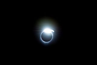 One year after the Great American Solar Eclipse on Aug. 21, 2017, data is still coming back. Here, the "diamond-ring effect" is seen during the eclipse. This photo was taken from a NASA Gulfstream III aircraft flying 25,000 feet (7,620 meters) over the Or