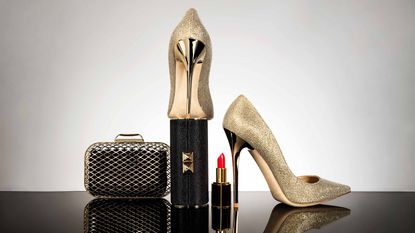 fancy purse, high heels and lipstick