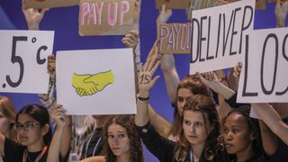 Climate activists protest in front of International Convention Center at the UN climate summit COP27 in Sharm el-Sheikh, Egypt on Nov. 19.