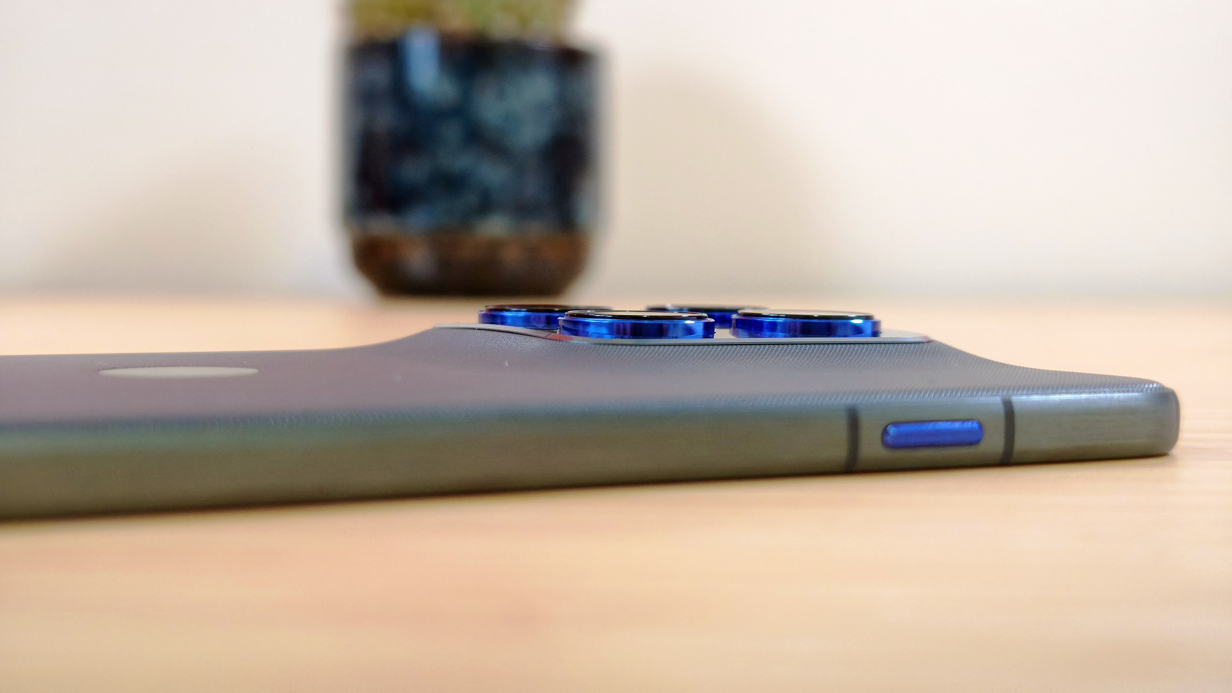 Motorola Edge 70 phone on a wooden desk