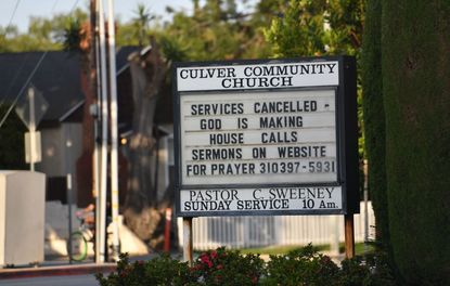 A church announces its services are online.