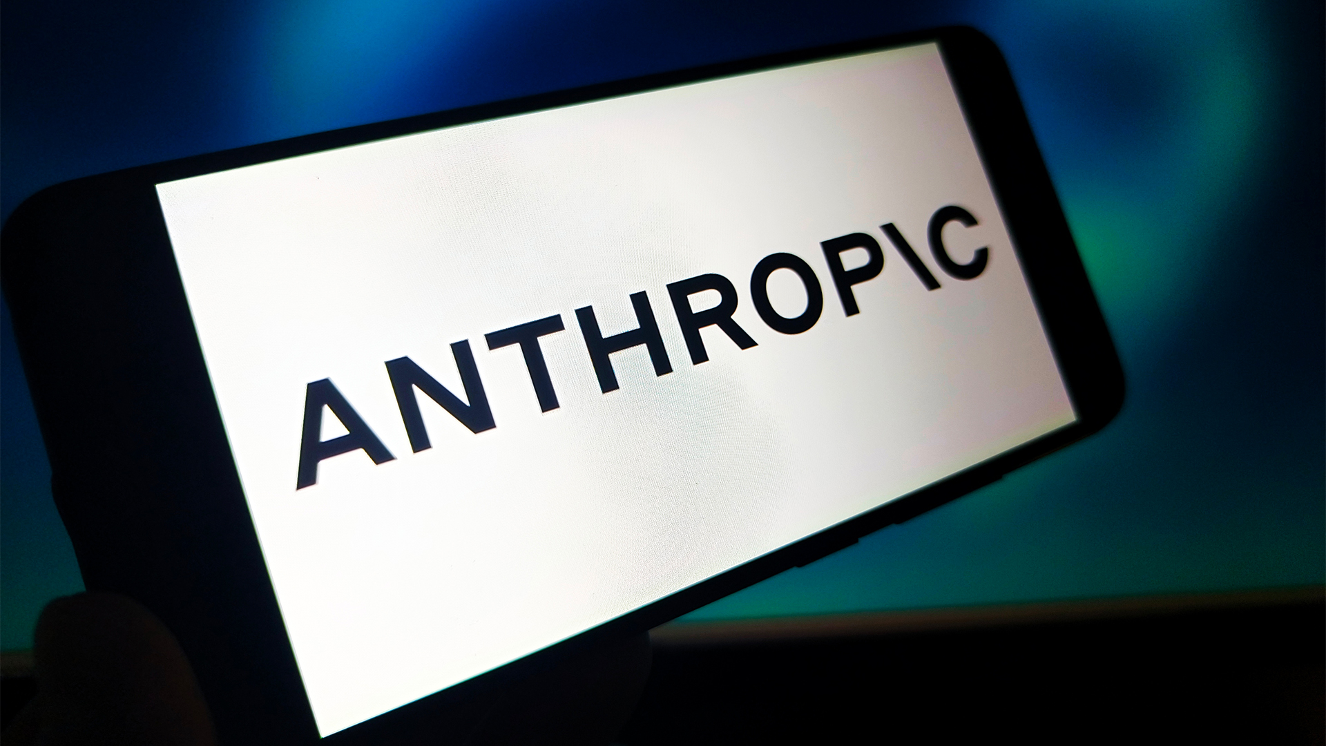 Anthropic company logo and branding pictured on a smartphone screen. 
