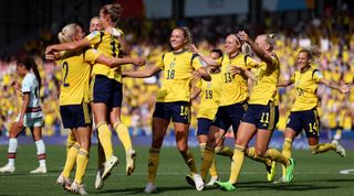 LEIGH, ENGLAND - JULY 17: Filippa Angeldal celebrates with Kosovare Asllani and Fridolina Rolfo of Sweden after scoring their team's first goal during the UEFA Women's Euro England 2022 group C match between Sweden and Portugal at Leigh Sports Village on July 17, 2022 in Leigh, England.