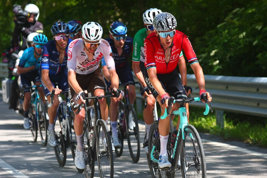 Groupama FDJs French rider Thibaut Pinot 2ndL Team Arkea Samsics French rider Warren Barguil R and AG2R Citroen Teams French rider Aurelien ParetPeintre 3rdL ride in a breakaway in the eighteenth stage of the Giro dItalia 2023 cycling race 161 km between Oderzo and Val di Zoldo on May 25 2023 Photo by Luca Bettini AFP Photo by LUCA BETTINIAFP via Getty Images