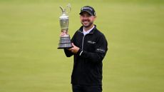 Brian Harman of the United States poses for a photograph with the Claret Jug on the 18th green as he celebrates winning The 151st Open on Day Four of The 151st Open at Royal Liverpool Golf Club on July 23, 2023 in Hoylake, England.