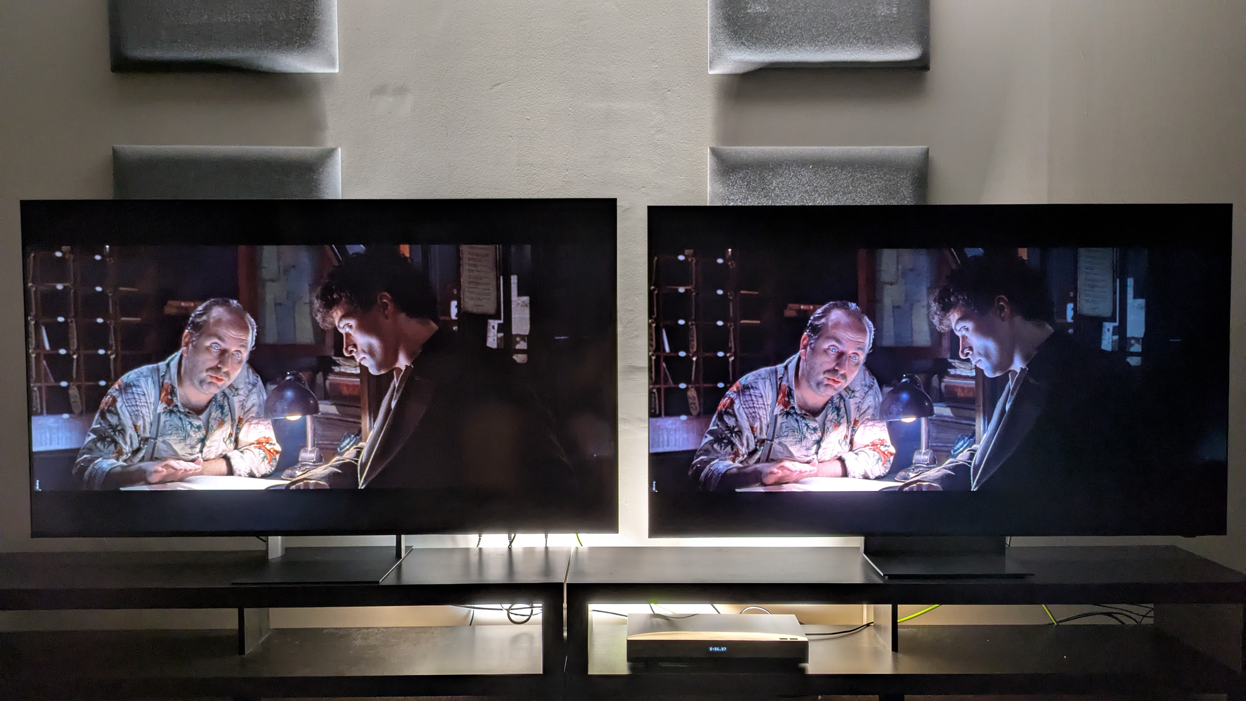 Sony Bravia 7 II (left) vs Samsung R95H (right) showing Dark City on screen. Both TVs show great shadow detail, but the R95H has more range