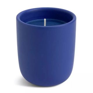 Blue candle in blue jar