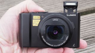Panasonic Lumix LX15 being held in palm of reviewer's hand