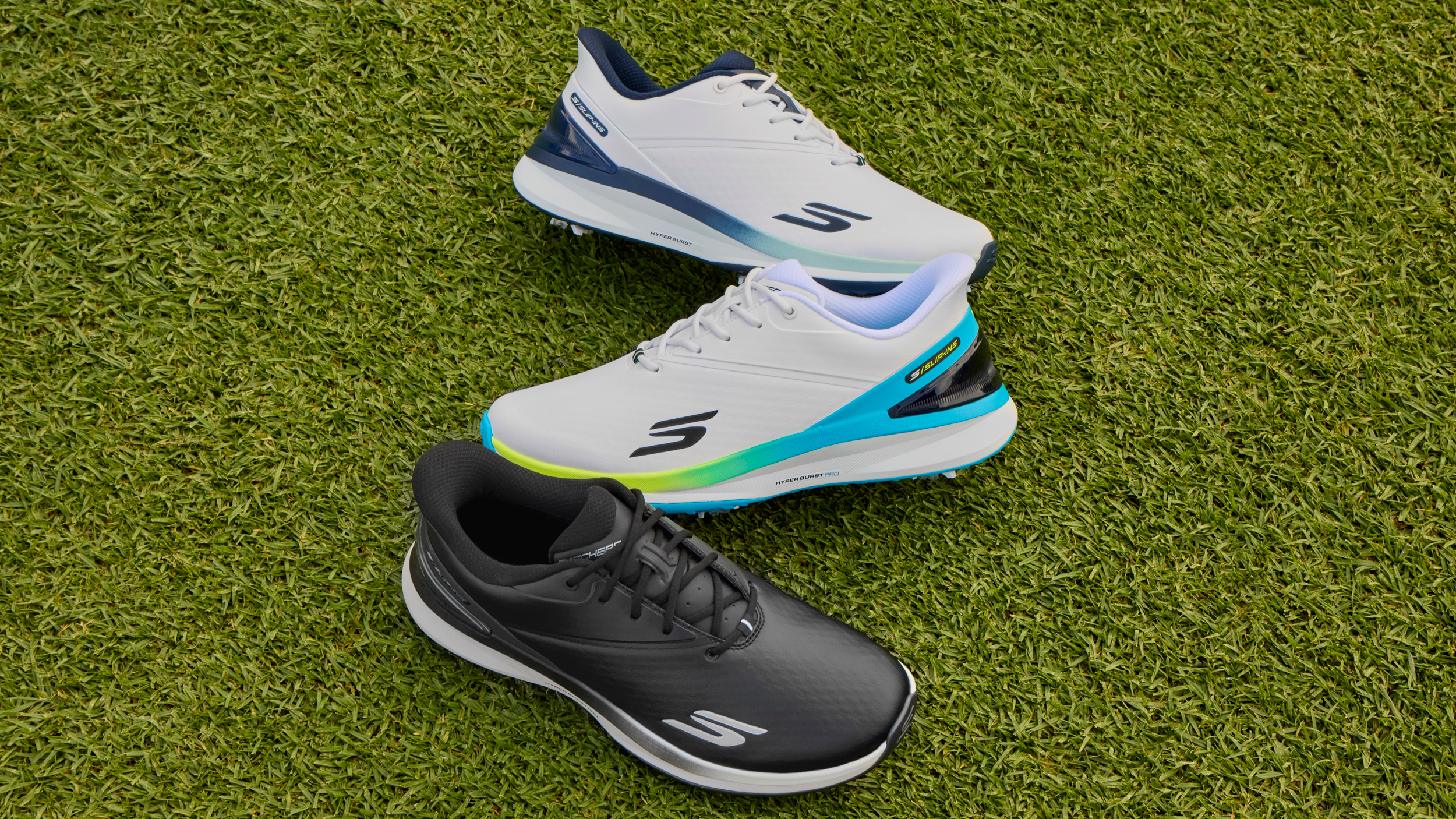 Three Skechers Golf shoes on grass