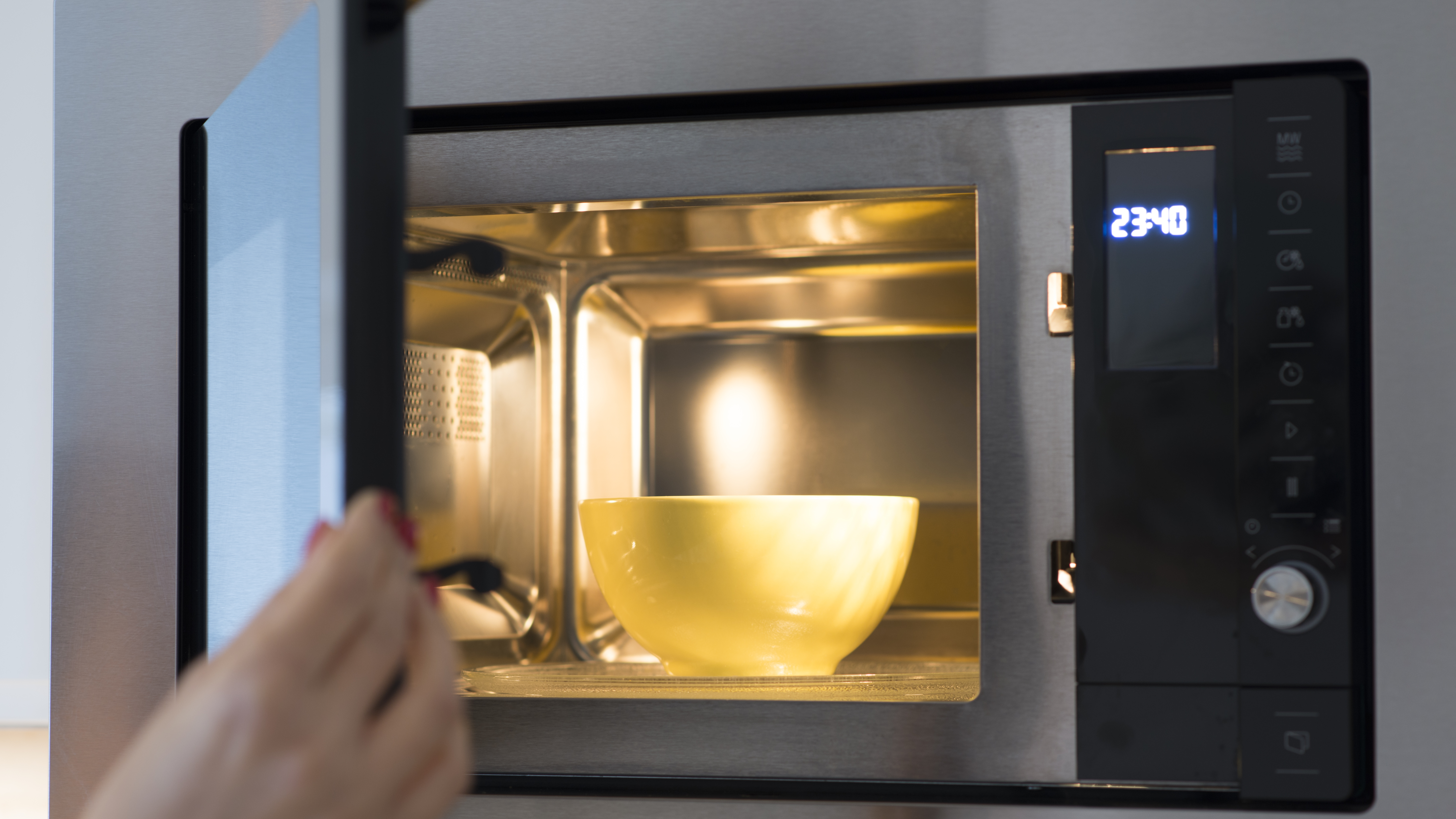 Bowl of vinegar inside a microwave