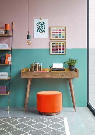 Colour blocking in a small home office with turquoise and pink walls