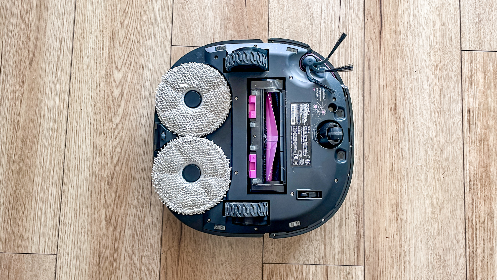 Eureka J15 Max Ultra robot vacuum on hard wood floor