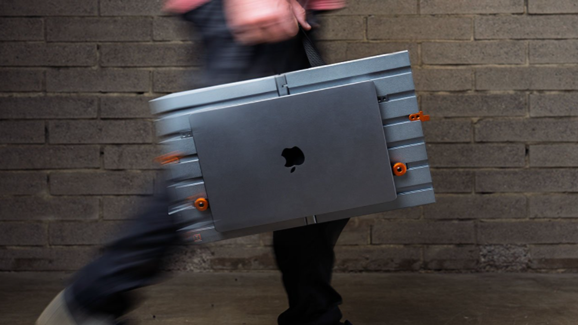 This sleek aluminum workstation folds into your backpack, yet your ,000 MacBook Pro may not feel safe there