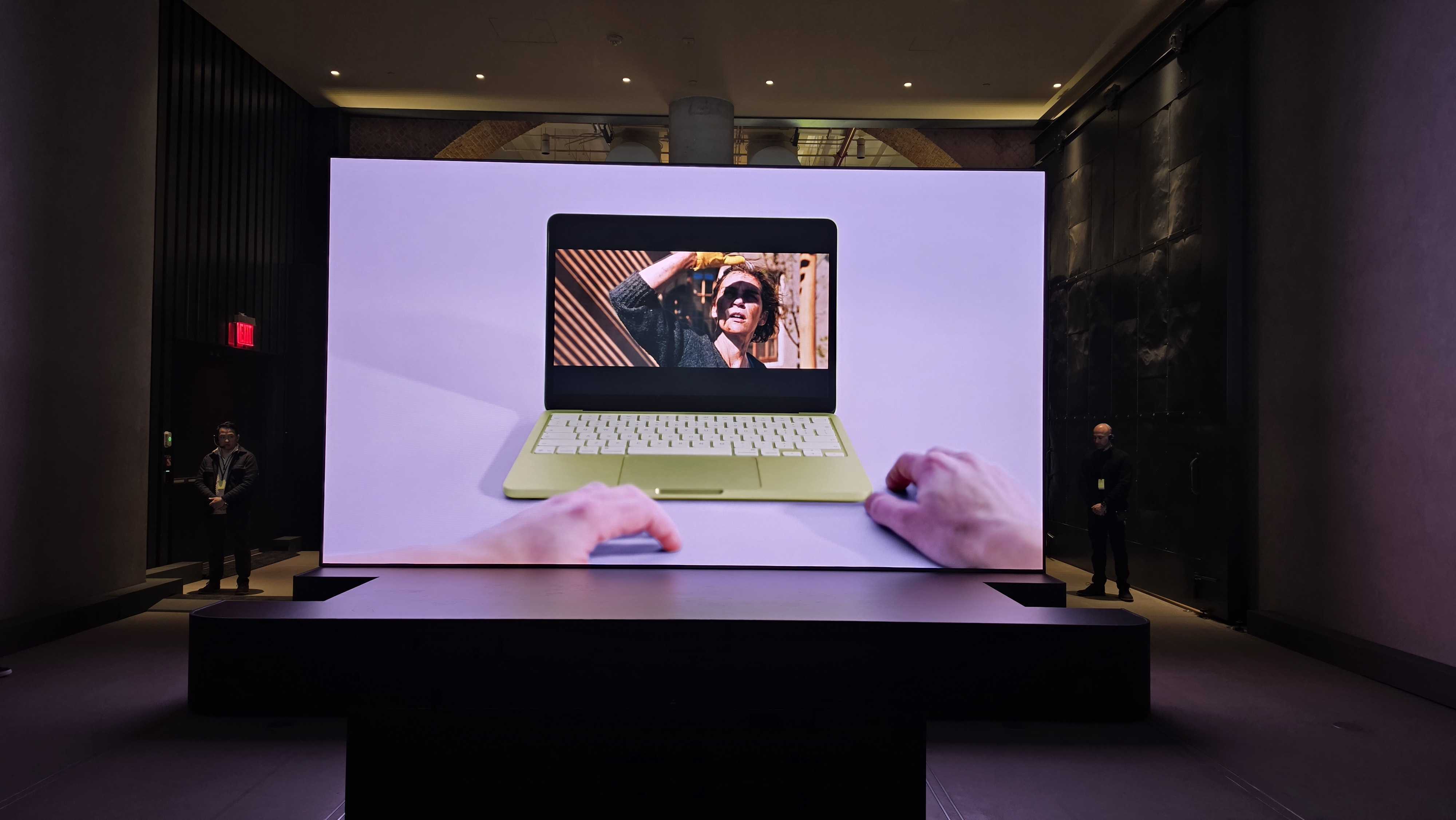The MacBook Neo with a man's hands