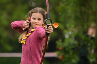 Princess Charlotte doing archery