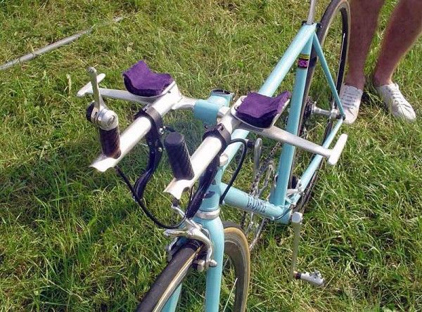 These aero bars are completely custom. They took Obree three months to whittle down from a solid piece of aluminium.