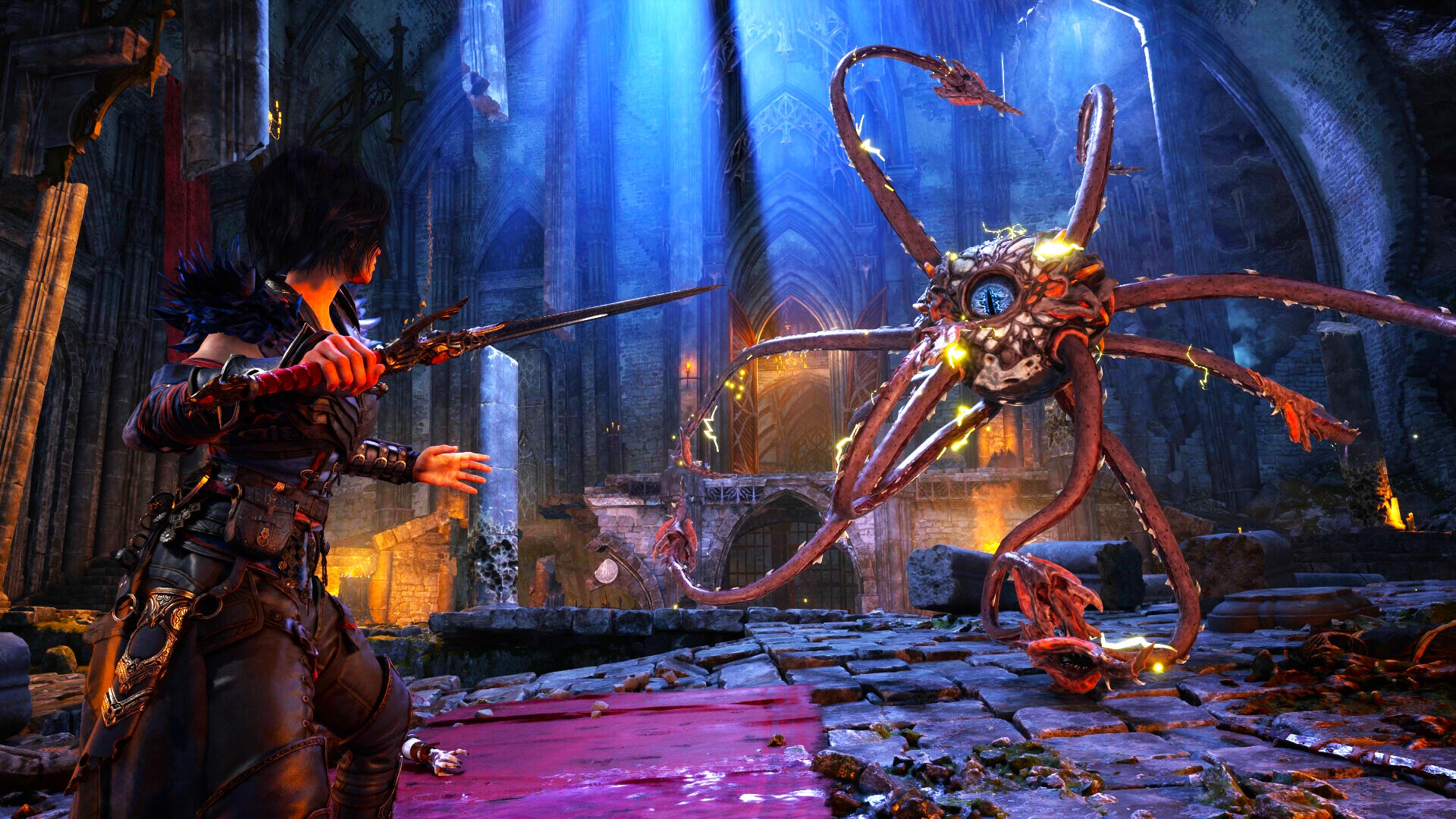 A dark-haired warrior in fantasy armor holds a sword, facing a floating, tentacled creature with a single glowing eye inside a ruined stone hall.