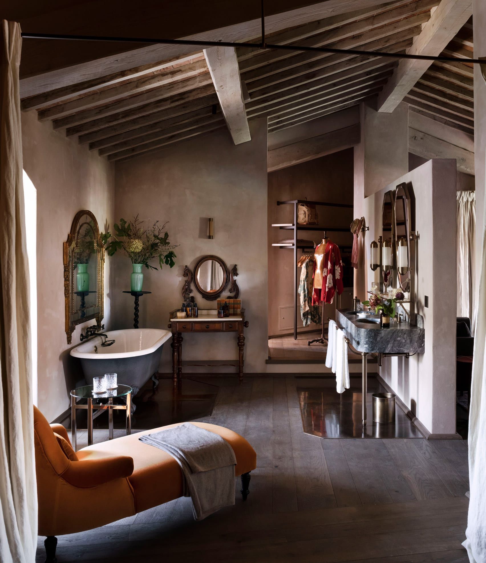 A series of images depicting the palatial interiors and leafy, sun-filled exterior of a castle revived as a contemporary design holiday destination.