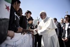 Pope Francis greets migrants in Greece