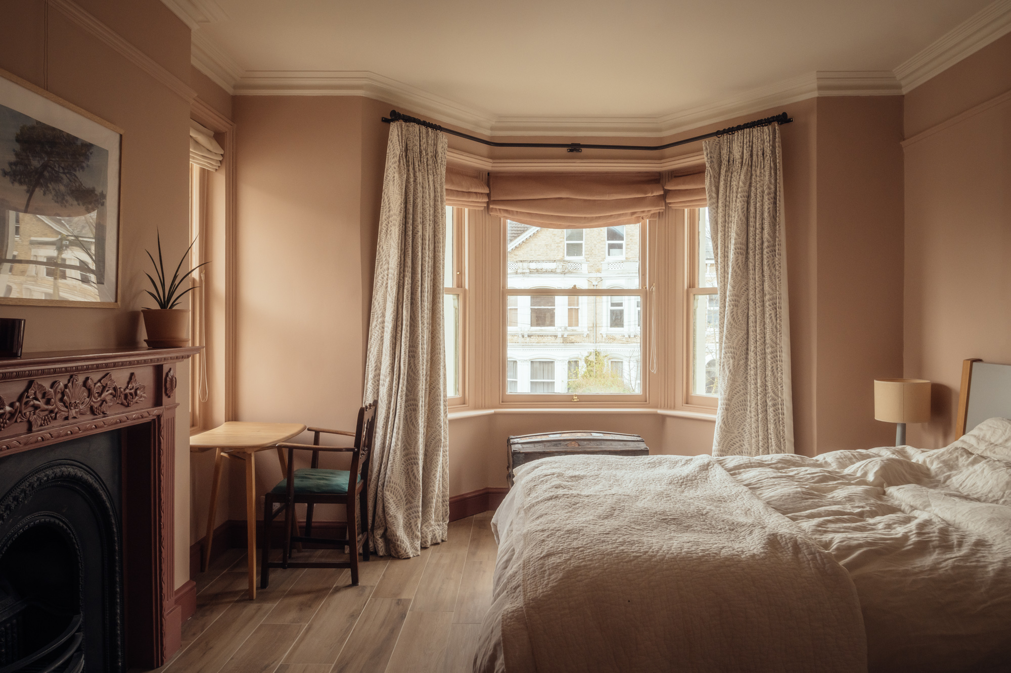 The bedrooms at the front of the house retain their period details