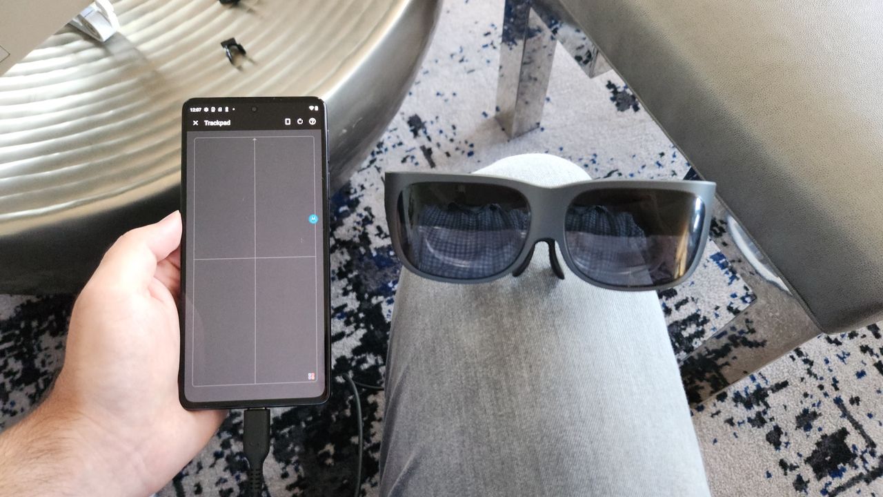 Lenovo Glasses T1 and Motorola Edge phone with trackpad controls