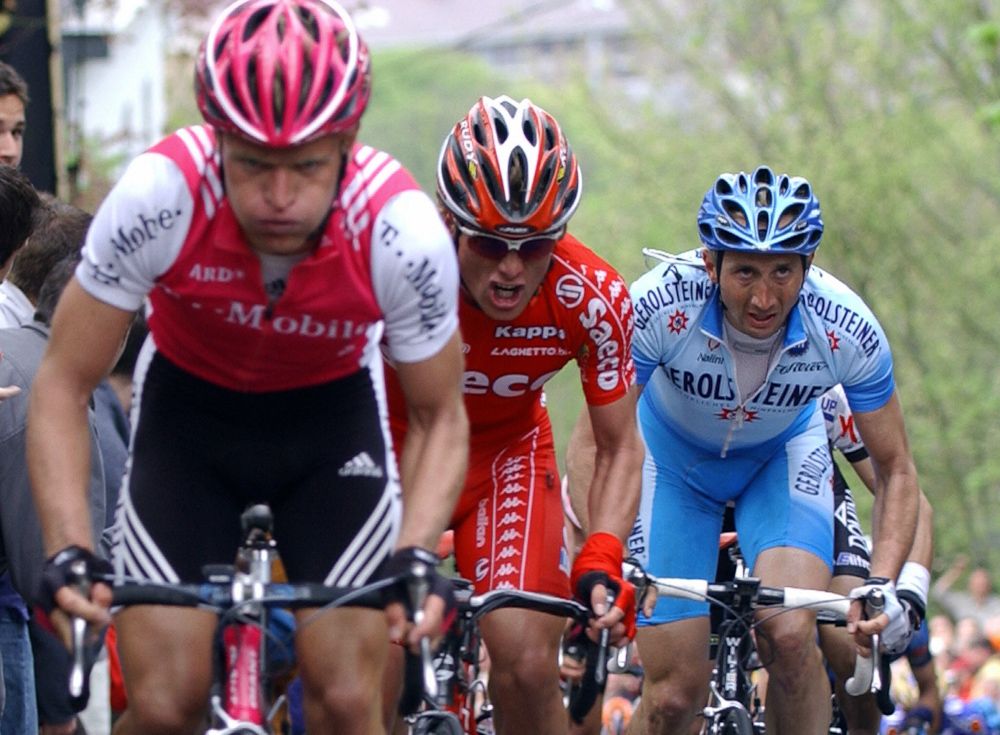 Davide Rebellin (Gerolsteiner), Danilo di Luca (Saeco) and Matthias Kessler (T-Mobile) force the pace during the 68th Fleche Wallonne in 2004. Rebellin finished ahead of di Luca and Kessler.