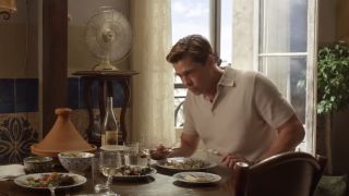 Brad Pitt eating in Allied