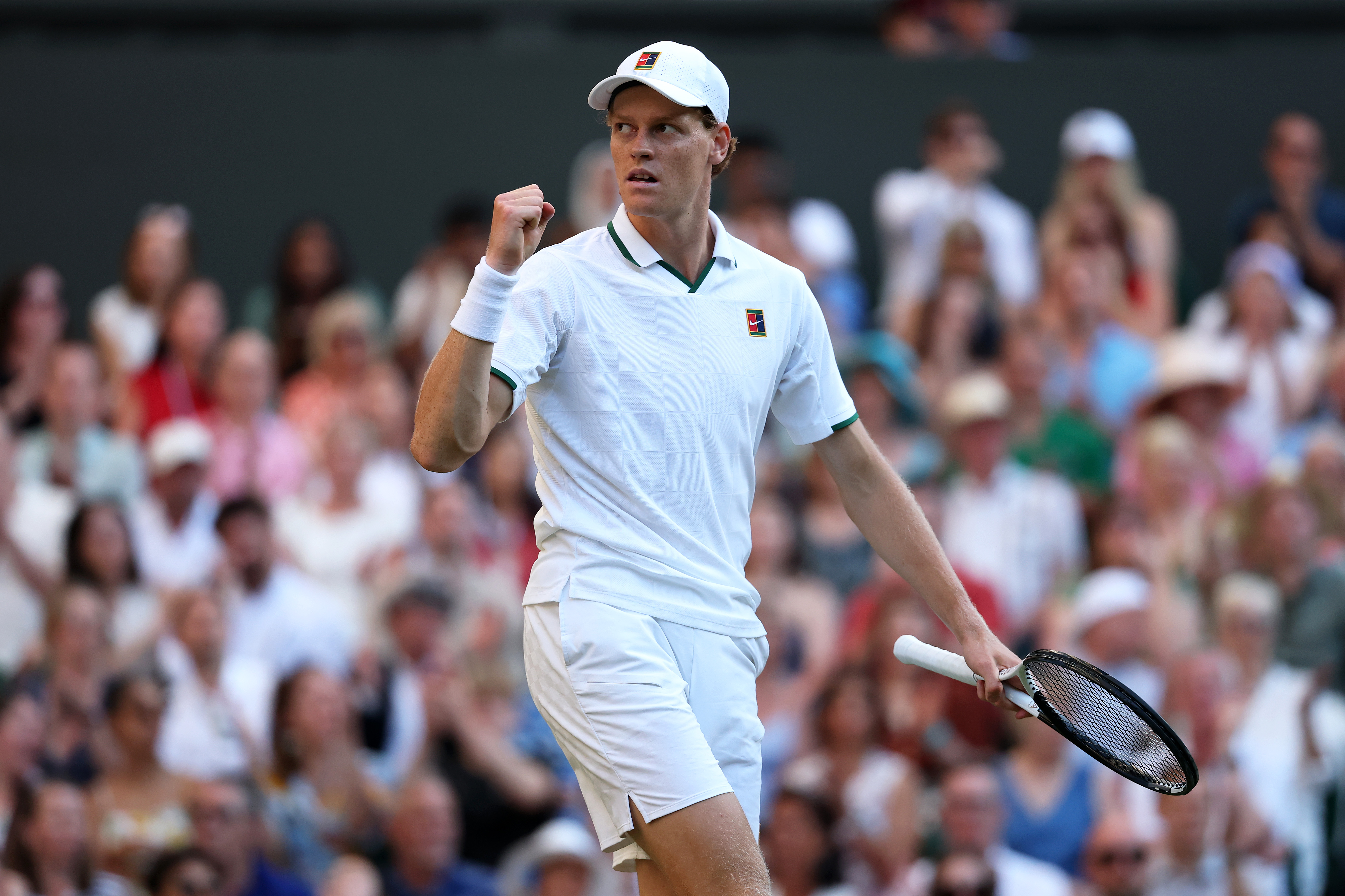 Jannik Sinner with racquet in hand