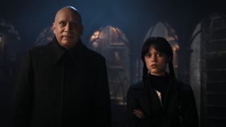 Fred Armisen as Uncle Fester and Jenna Ortega as Wednesday Addams in Netflix's Wednesday