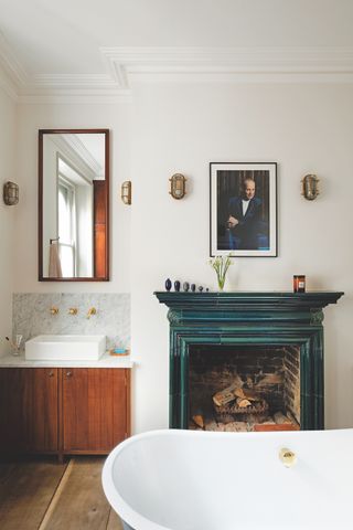 wooden vanity unit in bathroom