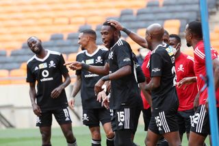 Fortune Makaringe celebrates his goal with teammates 