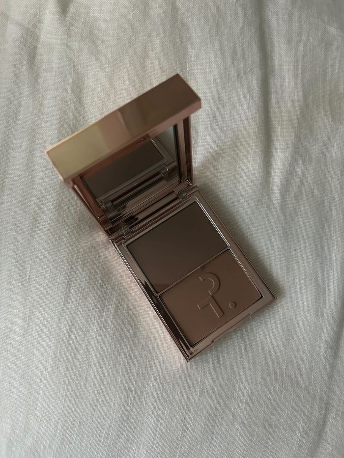 PATRICK TA Major Sculpt Crème Contour & Powder Bronzer Duo on a white linen background