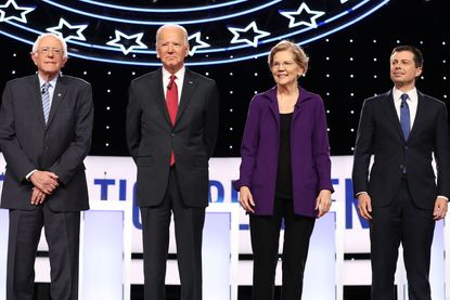 Elizabeth Warren with Bernie Sanders, Pete Buttigieg, and Joe Biden.