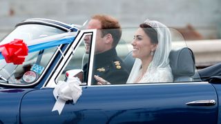 The Prince and Princess of Wales in a car after their 2011 wedding ceremony