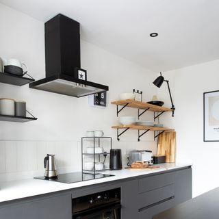 Black extractor fan in modern kitchen