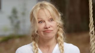 Screenshot of Pamela Anderson in pigtails on Pamela&#039;s Garden of Eden Season 2