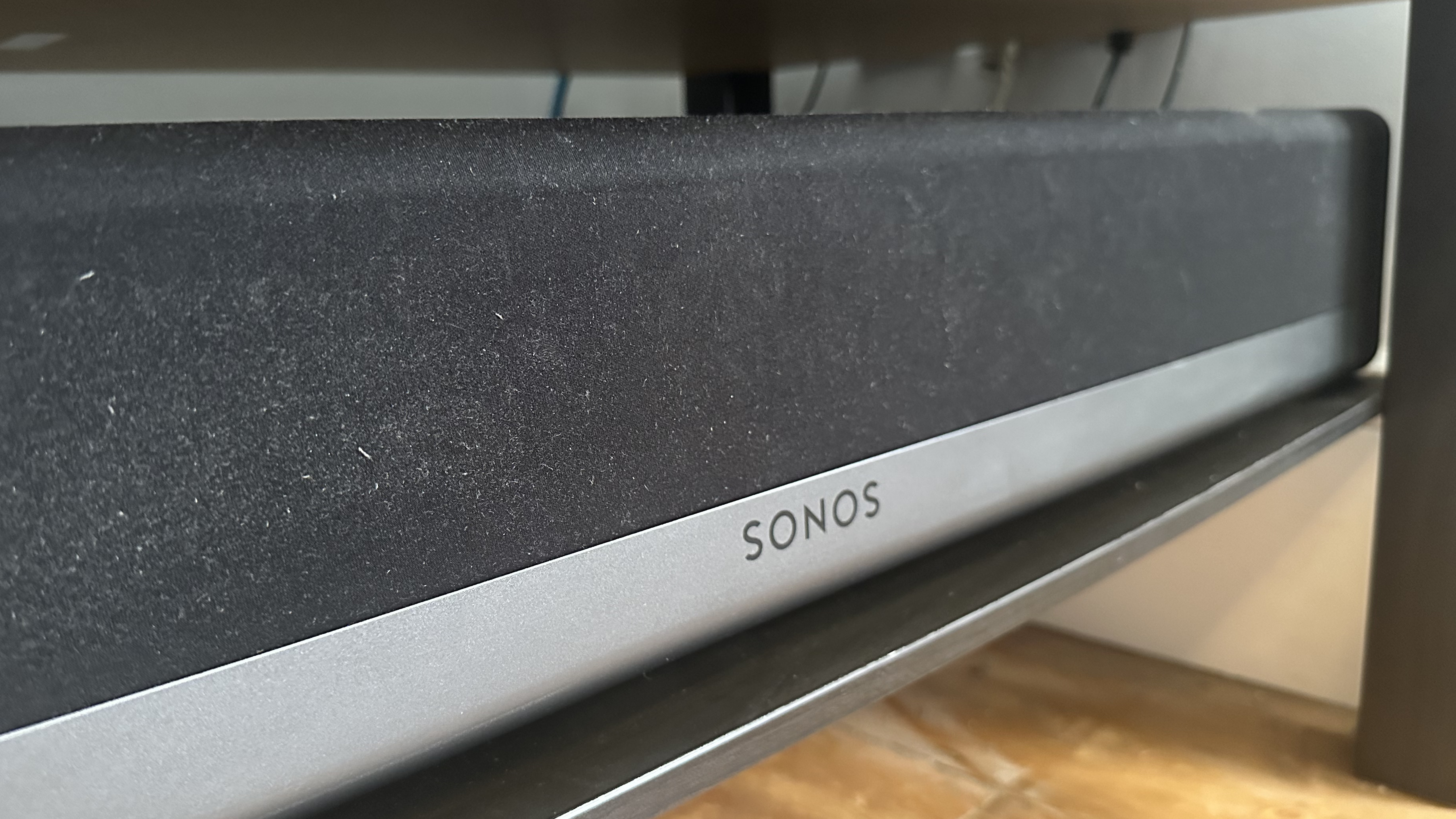 Sonos Playbar at an angle on shelf under TV