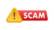 An alert symbol (an inverted yellow triangle with an exclamation mark on the front) next to a red badge bearing the white text "SCAM".