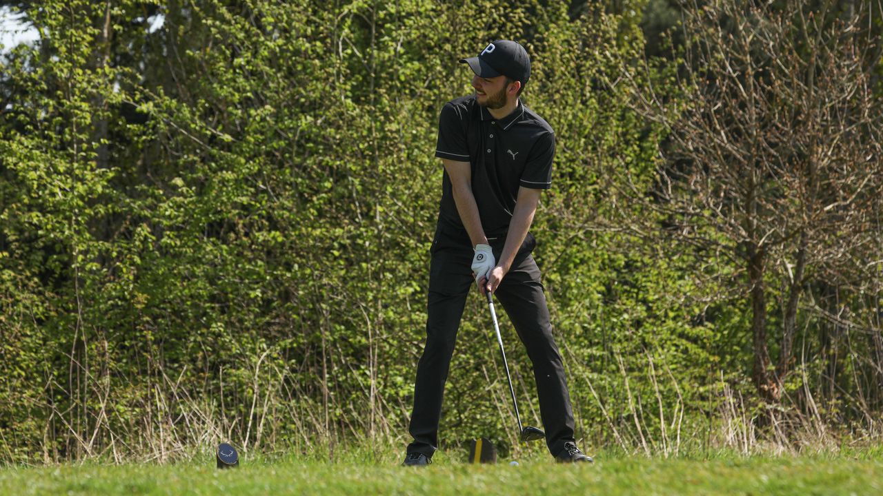 Dan Parker eyeing up a tee shot at Essendon Golf Club