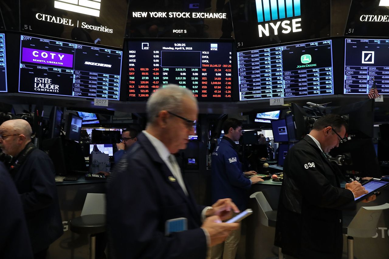 Traders at the New York Stock Exchange.