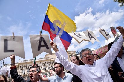 Supporters of a peace deal between Colombia and FARC rebels in Bogota.