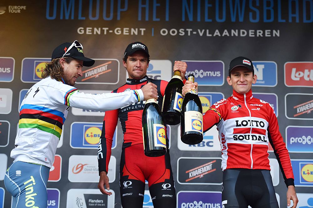 Cheers on the podium at Omloop Het Nieuwsblad
